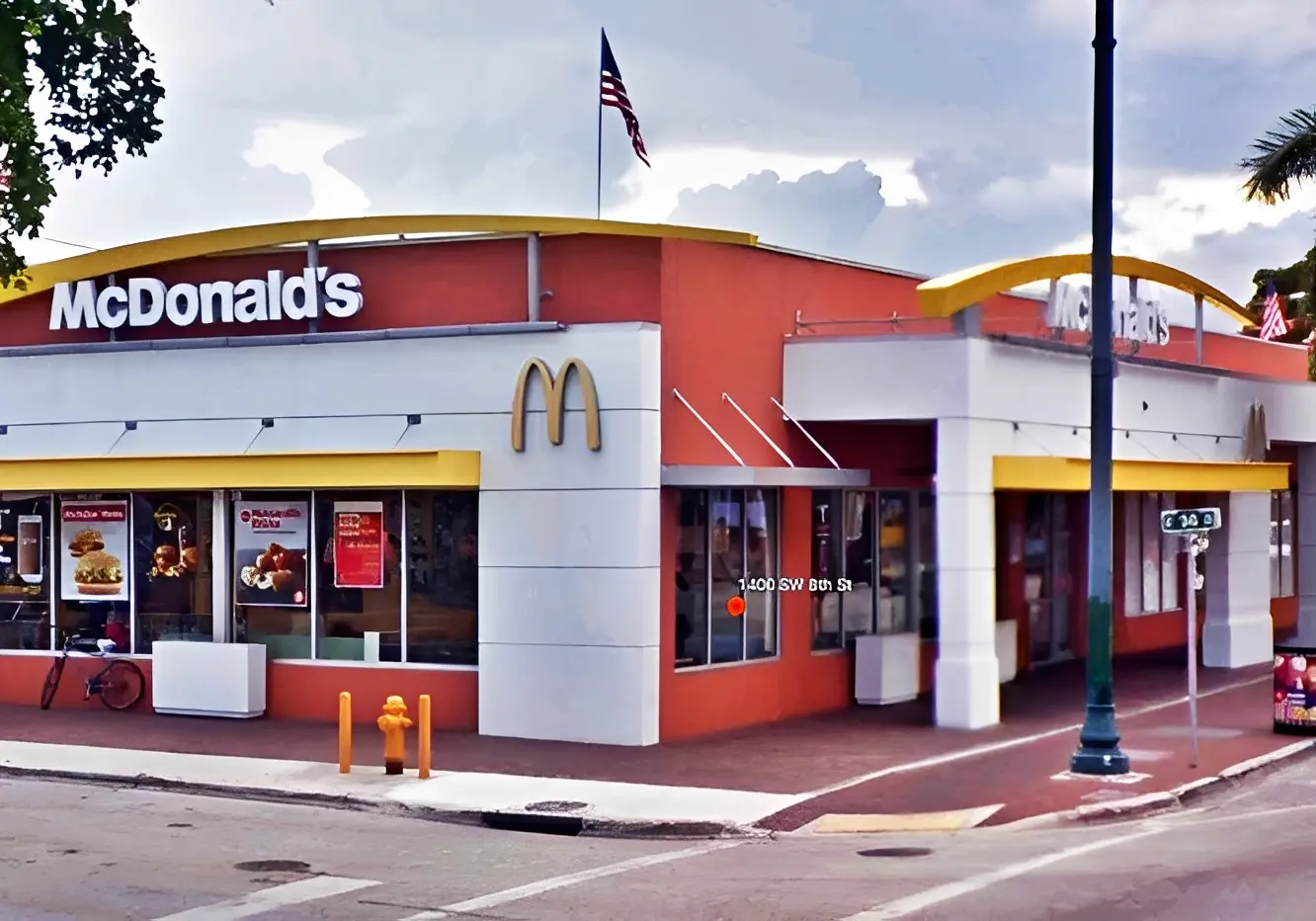 McDonald's restaurant exterior with American flag.